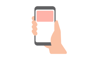 スマートフォンを手に握っている画像