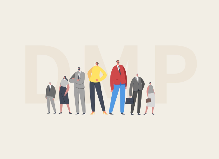 An image of the Digital Marketplace (DMP), showing seven people against a background of the letters DMP.